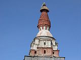 Tibet Guge 03 Tholing 17 Yeshe O Chorten Towering above each of the four corners of Yeshe O's Mandala Chapel complex are the only stupas of the Indian prasada style in existence. They are also uncommon in being made up of terracotta, since most Tibetan stupas are made from mud and stone.